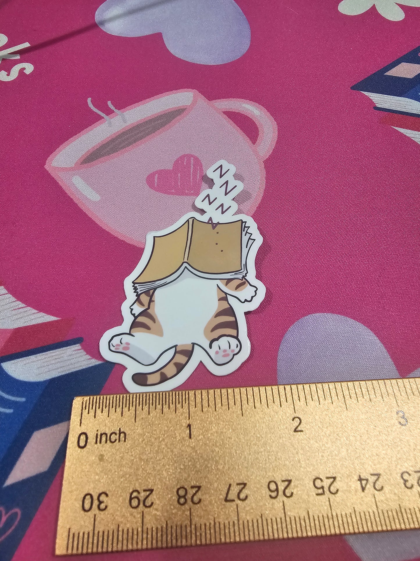 Sleeping Cat Under Book Sticker