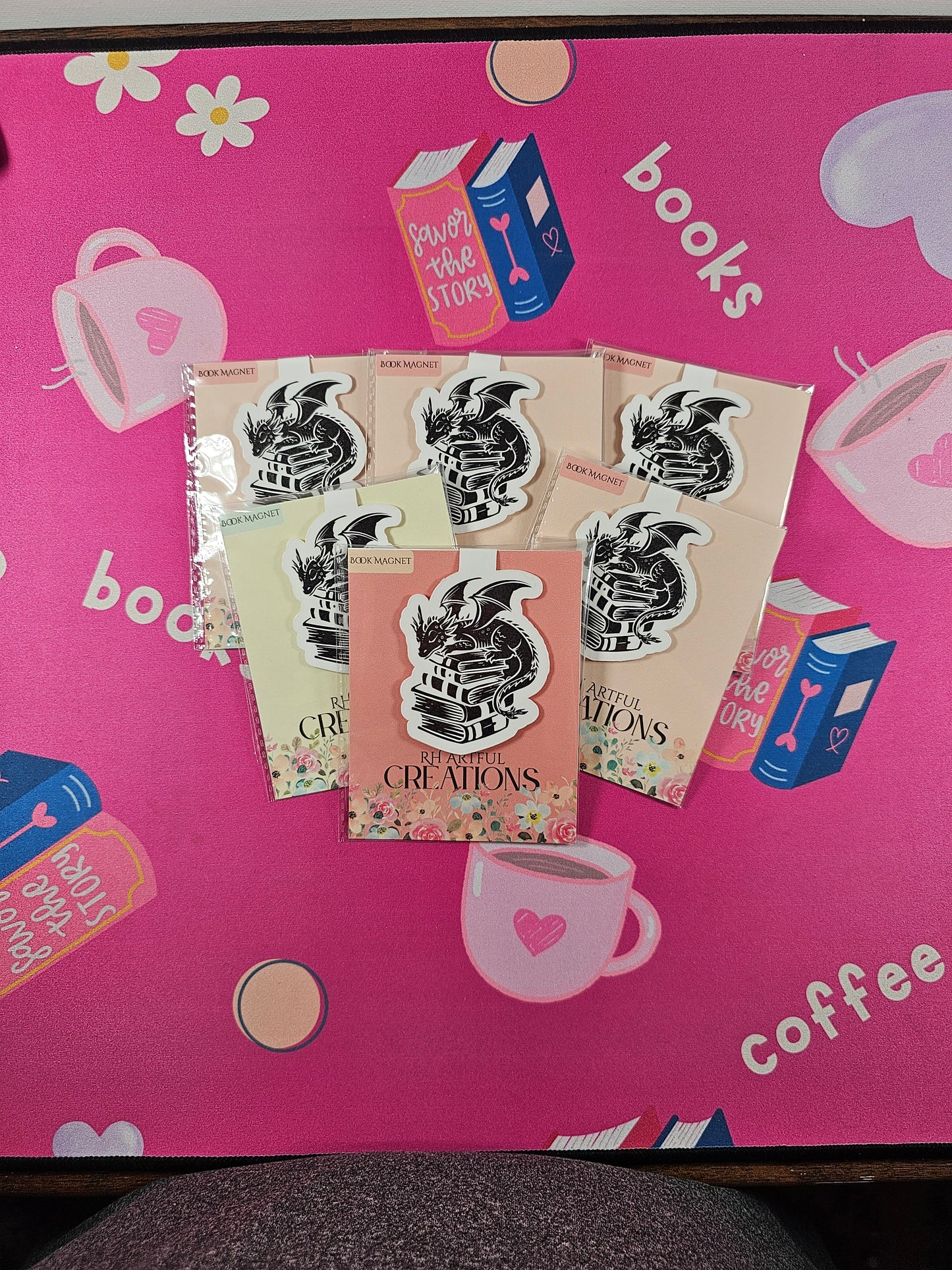 Set of stamps on a pink background with book and coffee cup designs