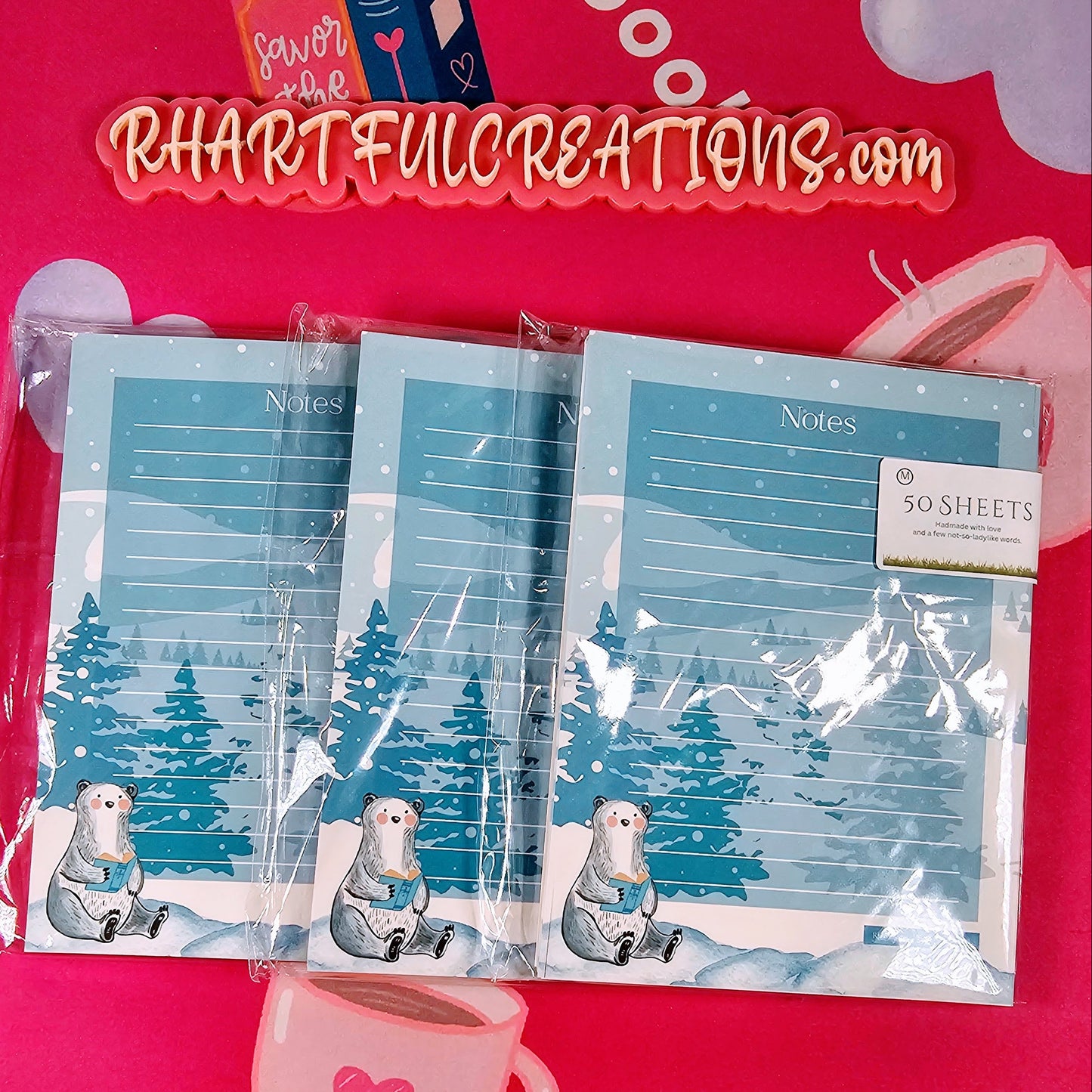 Three packages of stationery with polar bear designs on a pink background with 'RHARTFULCREATIONS.com' branding.