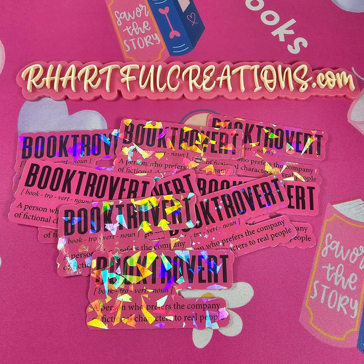 Pink bookmarks with 'Booktrotter Creations' branding on a pink background
