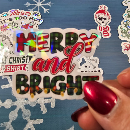 Decorative sticker with colorful text on a blue background with snowflakes