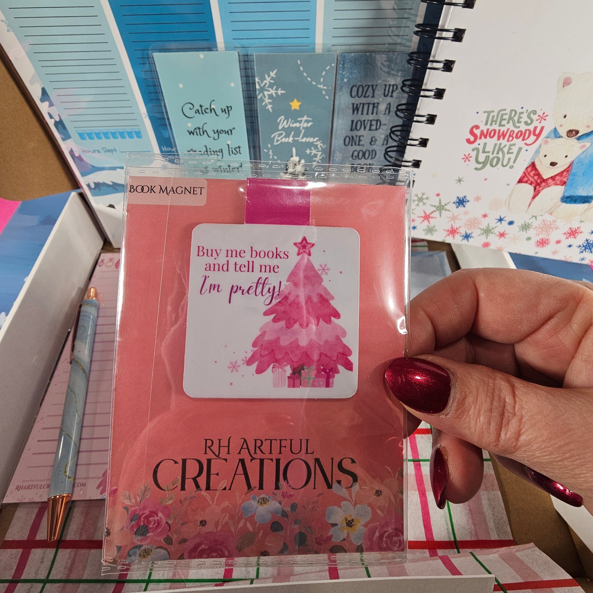 Book magnet that says “Buy me books and tell me I’m pretty” from RH Artful Creations