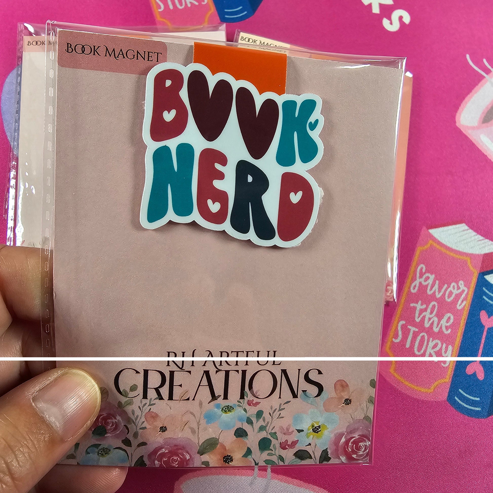 Colorful 'Bunk Nerd' sticker on a book with a pink background