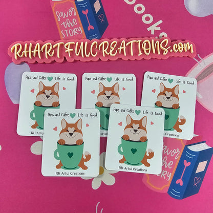 Cute “Pups & Coffee Life Is Good” sticker showing a happy dog inside a green coffee mug, handmade by RH Artful Creations