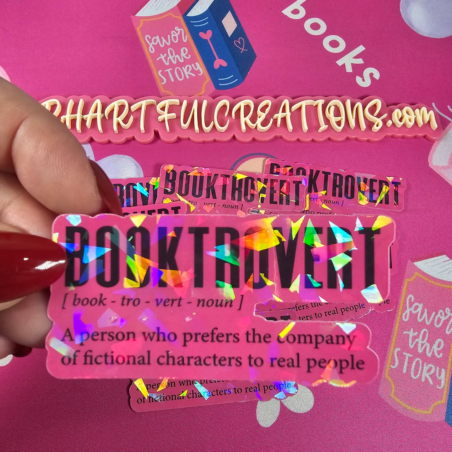 Colorful bookmarks with text on a pink background