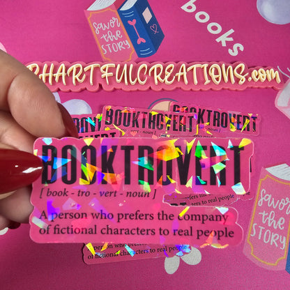 Colorful bookmarks with text on a pink background