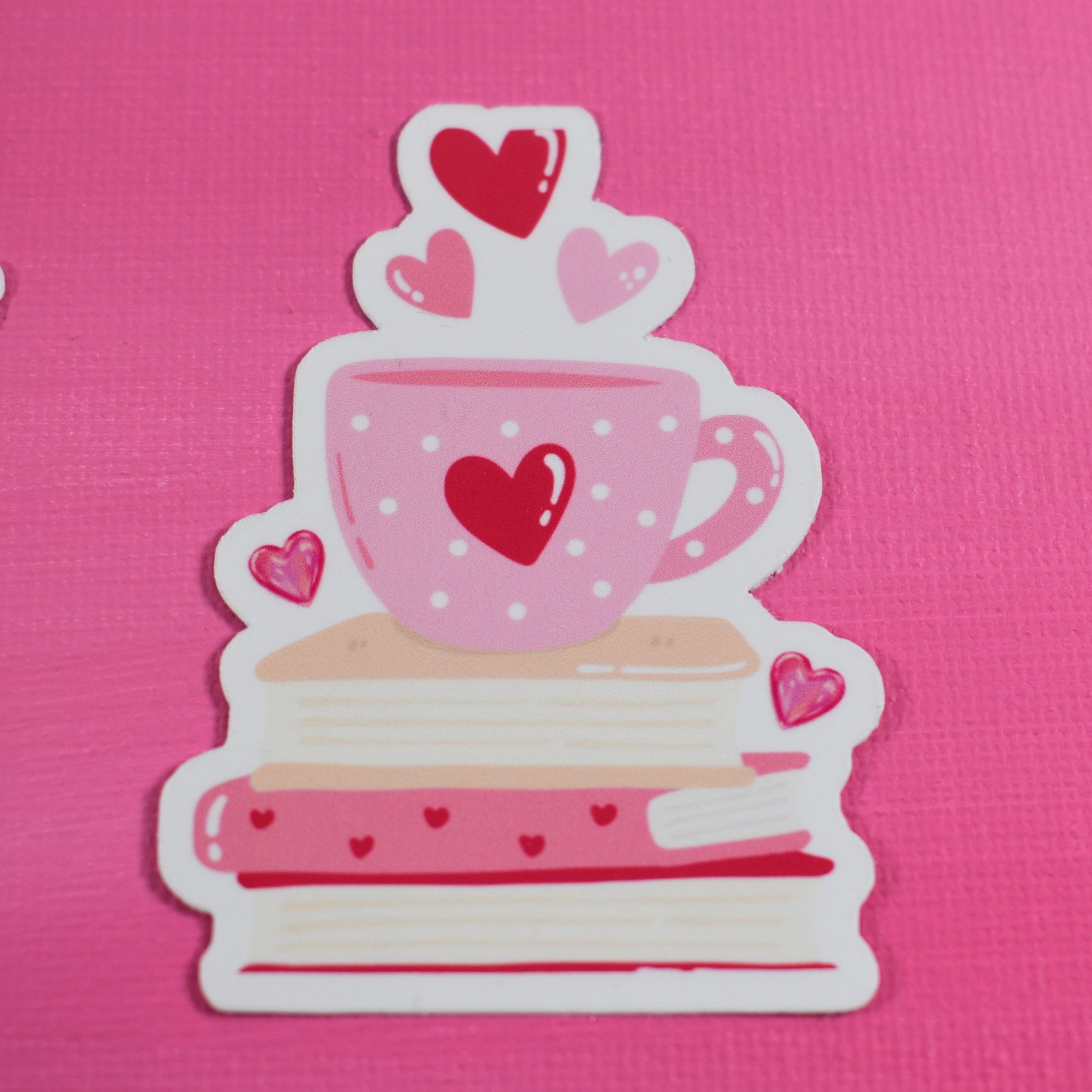 Decorative stickers with a cake and cup design on a pink background