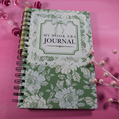 Green floral journal with 'My Book Era Journal' text on a pink background