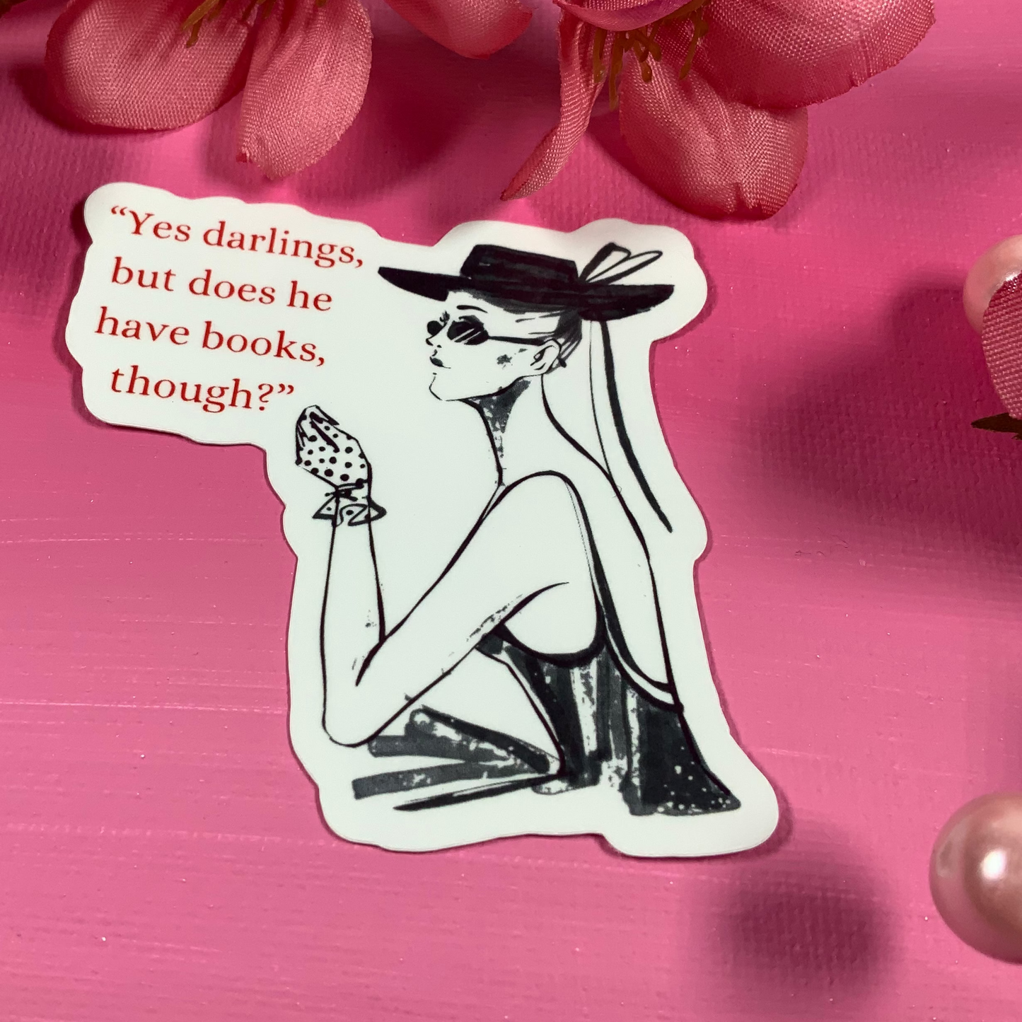 Sticker with a woman in a hat and text on a pink background with flowers