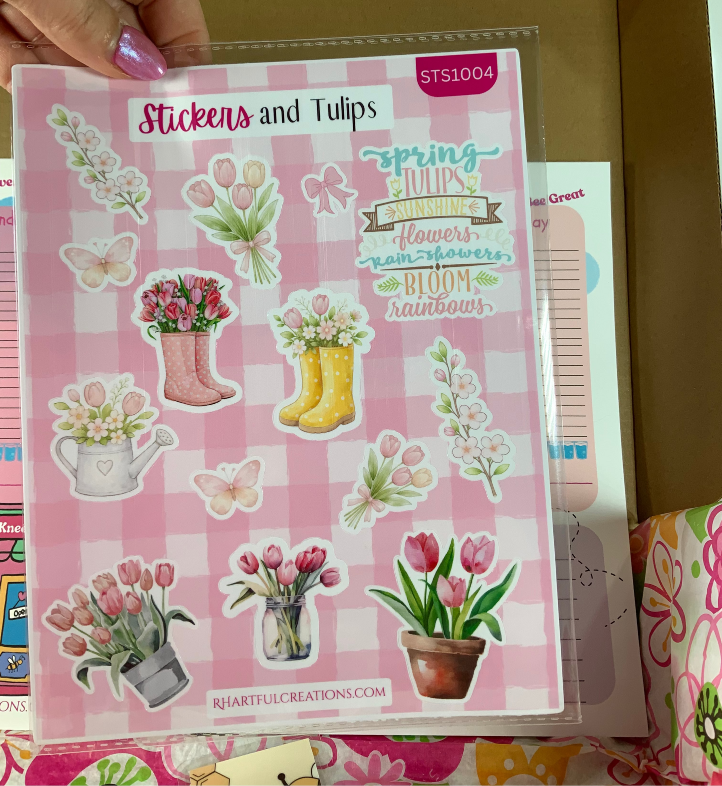 Stickers and Tulips sticker book with spring-themed designs on a checkered background.