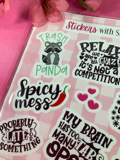 Pack of stickers with humorous designs on a pink background