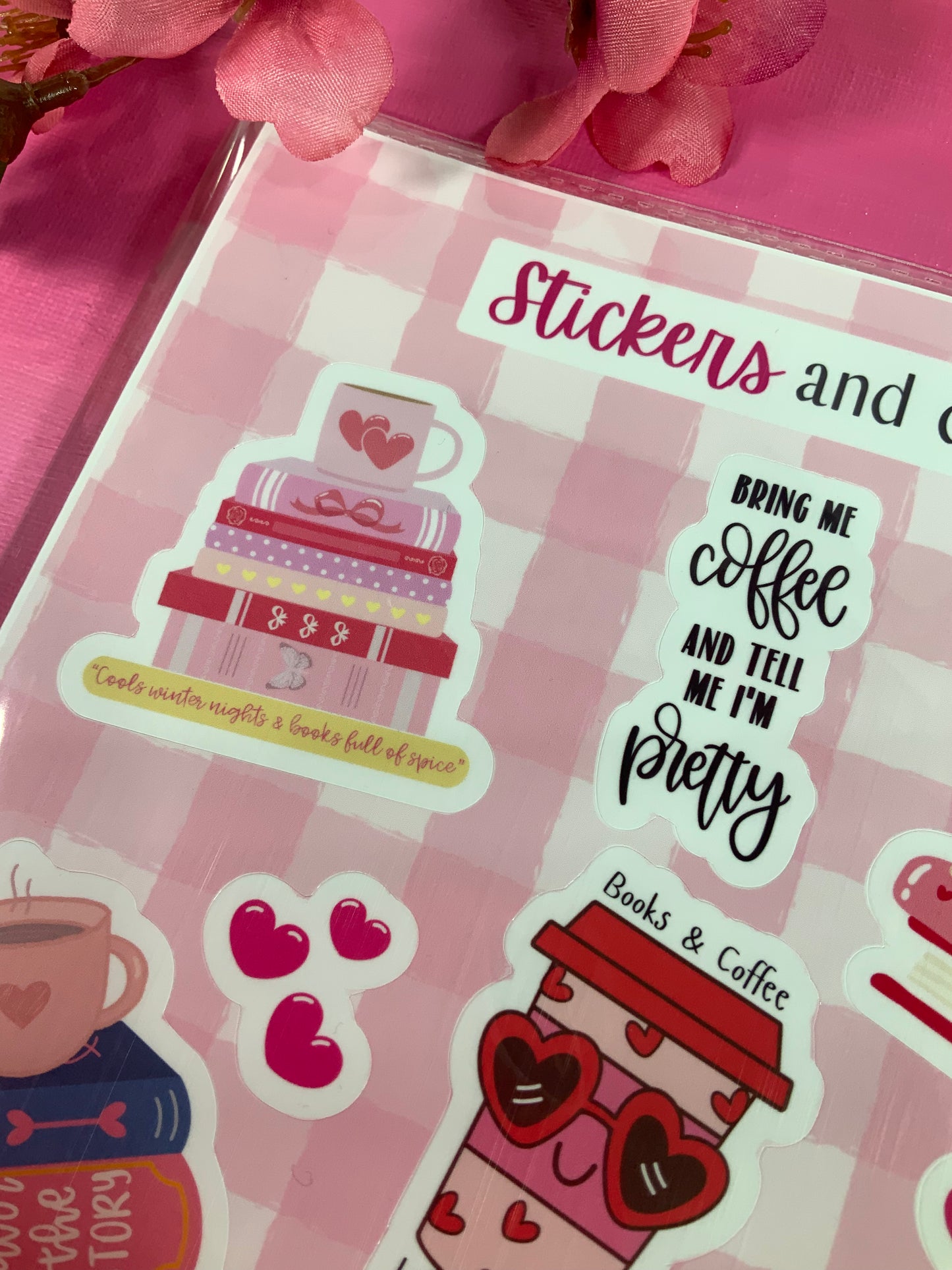 Sticker sheet with coffee-themed designs on a pink background