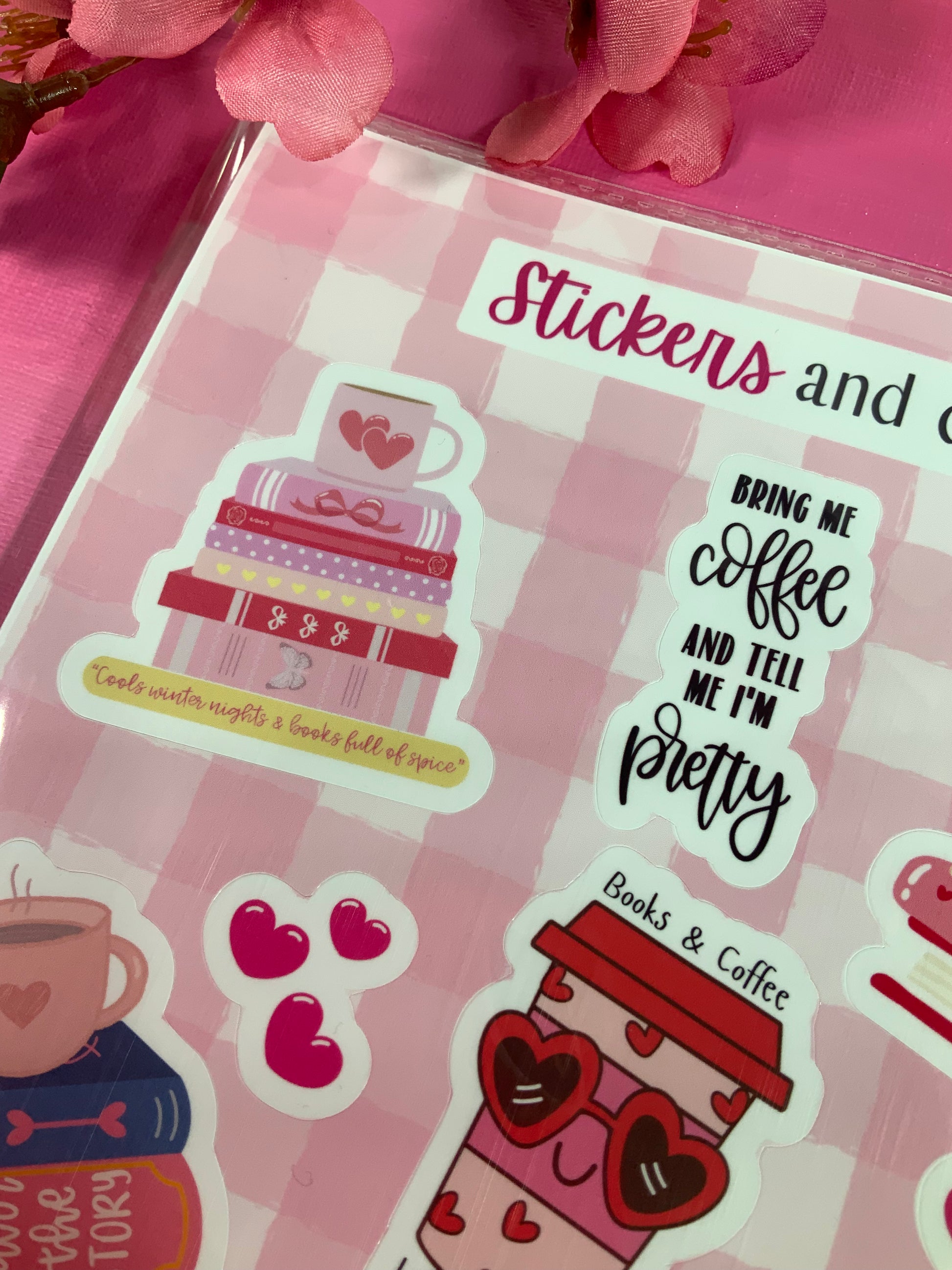Sticker sheet with coffee-themed designs on a pink background