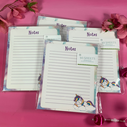 Note pads with 'Notes' text on a pink background with decorative elements