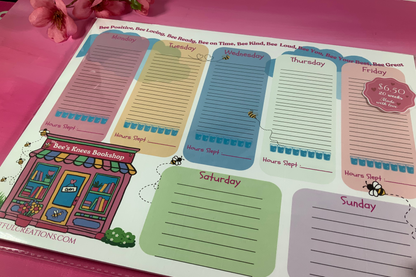Weekly planner stickers with days of the week on a pink surface