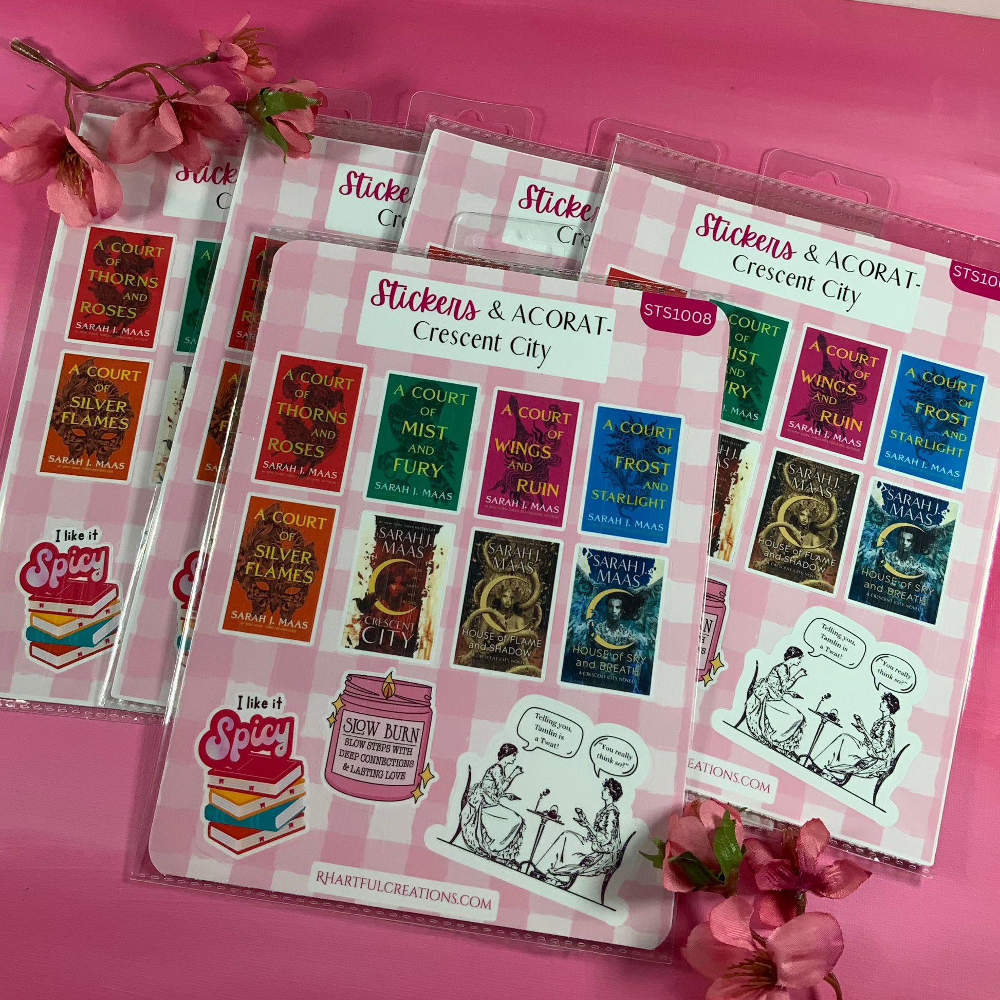 Sticker packs with colorful designs on a pink surface