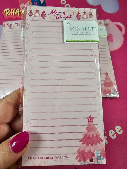 “Pink Merry & Bright Christmas notepad with ornaments and pink Christmas tree – handmade 50-page list pad by RH Artful Creations.”
