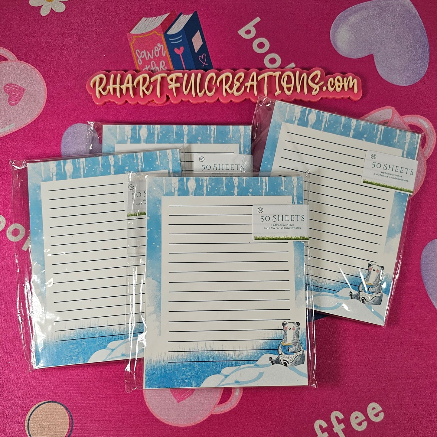 Handmade winter notepad with lined pages and an illustration of a cute polar bear reading a book while sitting on snowy ice, 50 sheets.