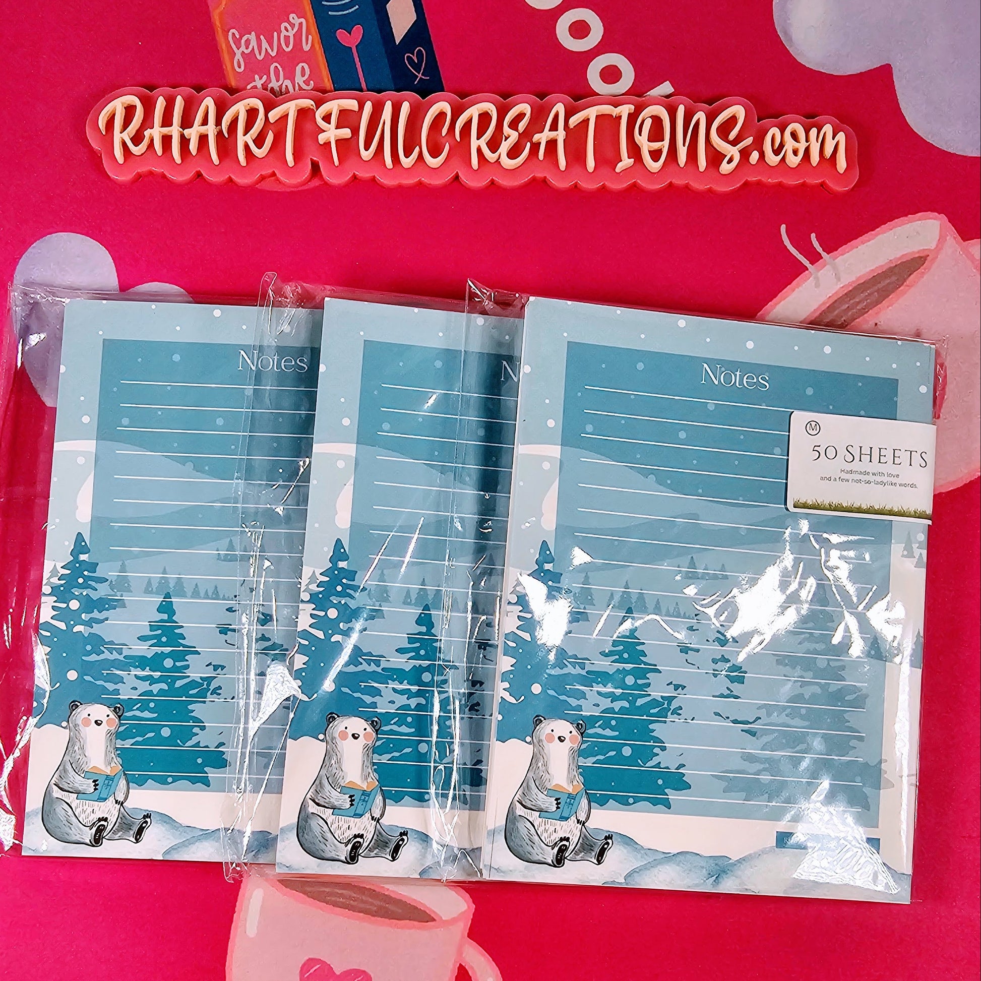 Three packages of stationery with polar bear designs on a pink background with 'RHARTFULCREATIONS.com' branding.