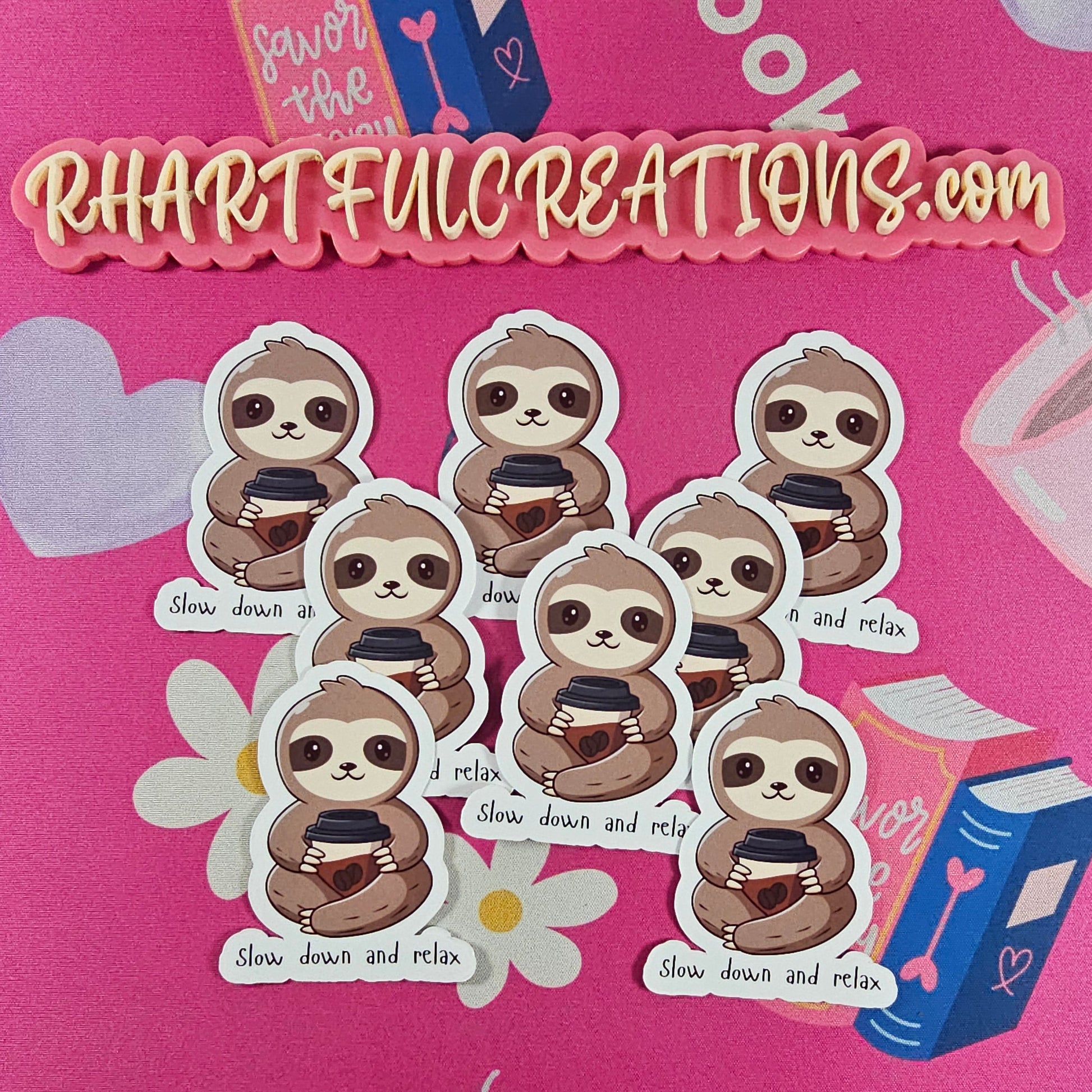 Cute handmade sloth sticker holding a coffee cup with the words “Slow down and relax”, cozy book lover decal by RH Artful Creations.