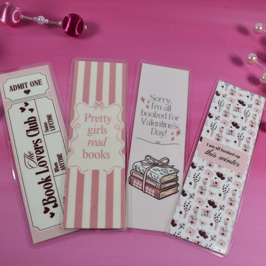 Valentine’s Day bookish bookmark collection in pink tones, including “Book Lovers Club,” “Pretty girls read books,” and “Sorry, I’m all booked for Valentine’s Day!”
