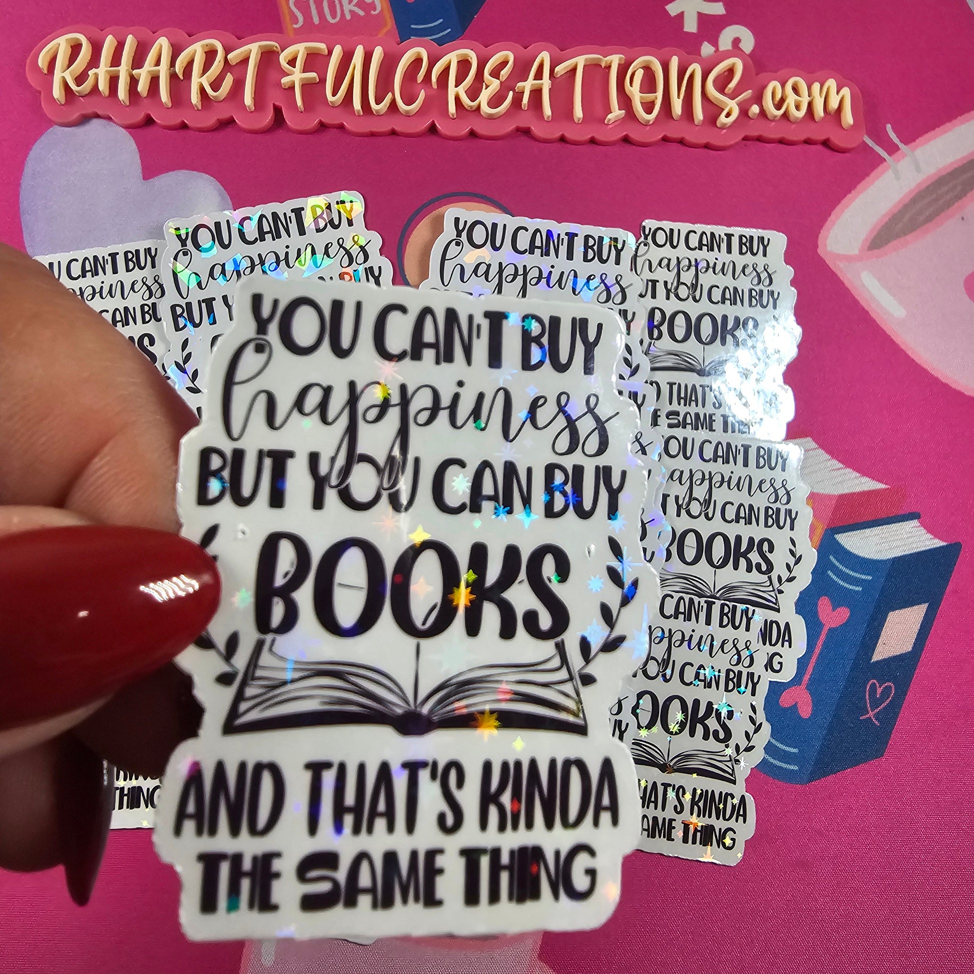 Stack of books with decorative text on a pink background